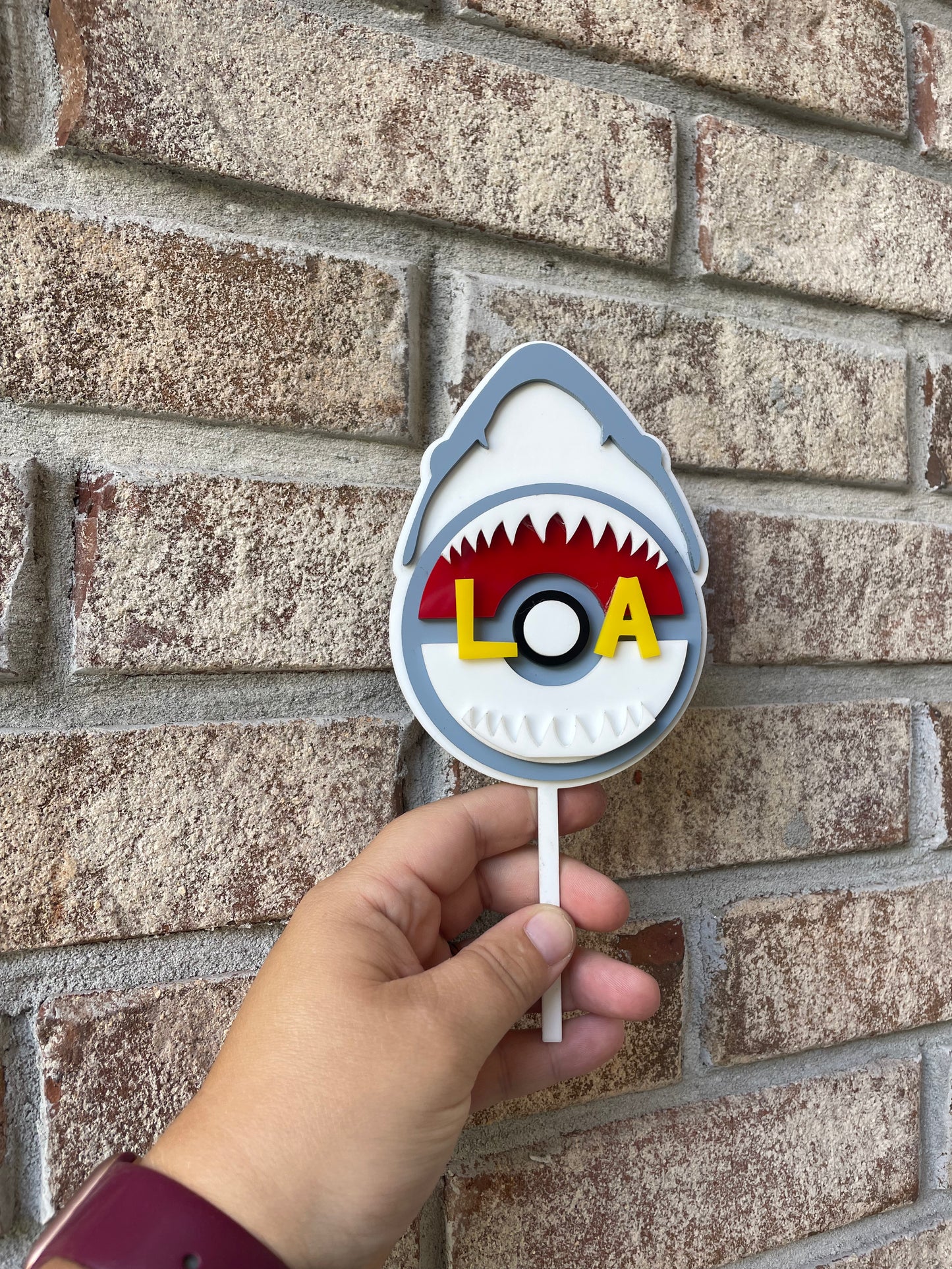 Megalodon Shark Holding a Pokemon Ball in its jaws with Name
