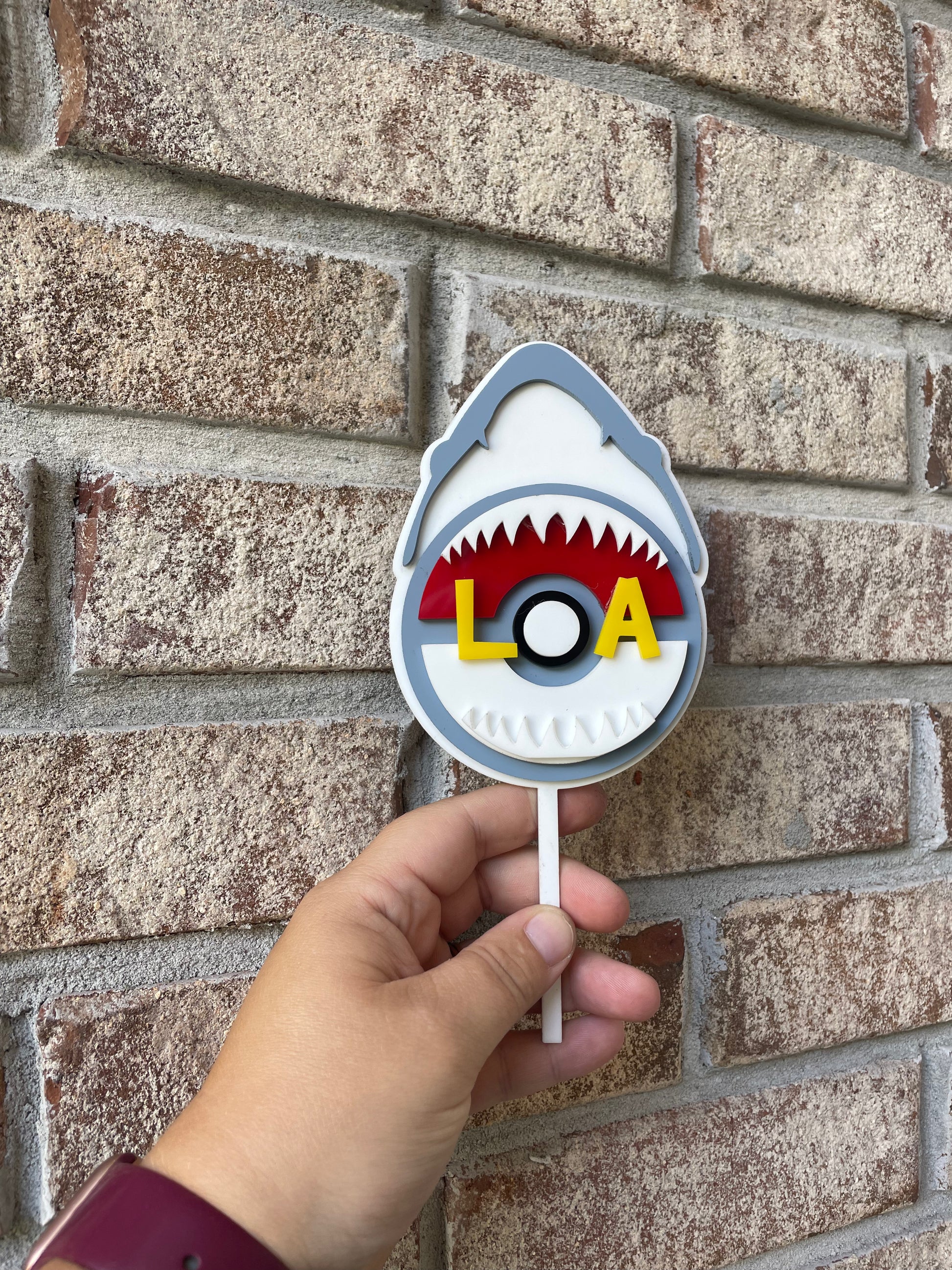 Megalodon Shark Holding a Pokemon Ball in its jaws with Name
